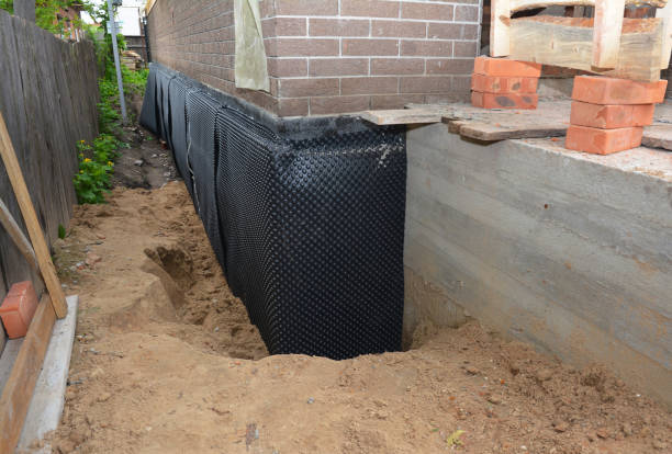 SJ Waterproofing Pros technician performing targeted Foundation Crack Repair assessment in Inver Grove Heights, MN